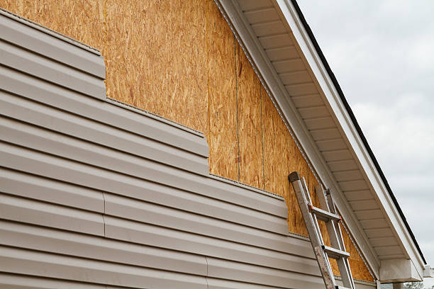 Professional Siding Replacement technician working in Vass, NC